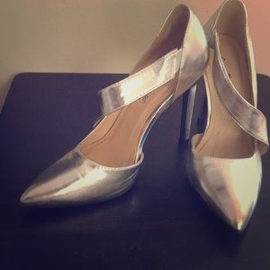 Silver pointy heels